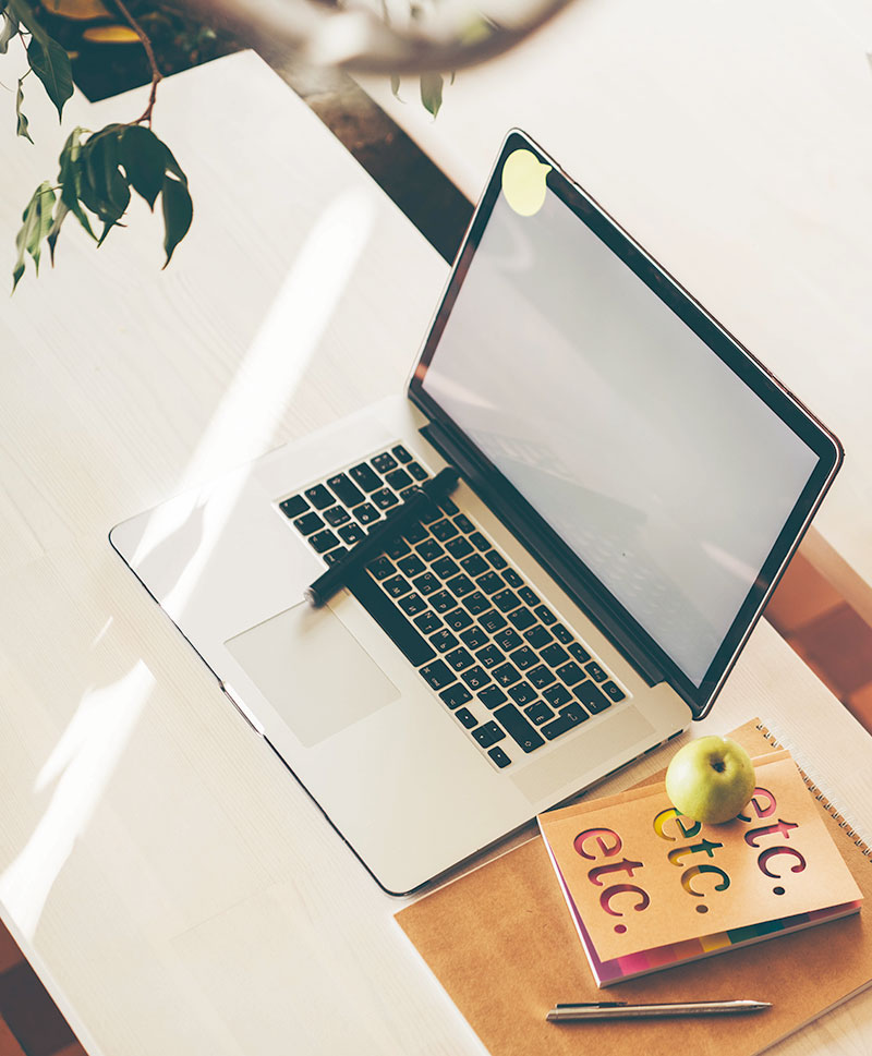 laptop-on-table-in-meeting-room-of-office-workspac-ATQMG7C.jpg